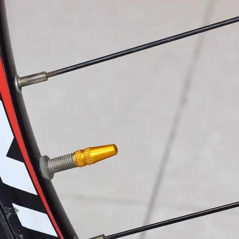 Tapon de aluminio para valvula de bicicleta (5 uds) dorado - imagen 3